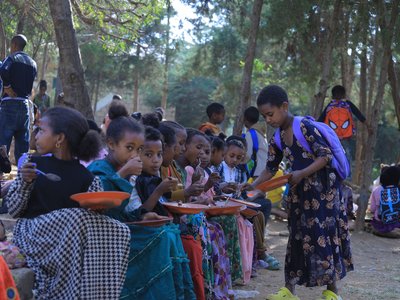 Children Enjoy Communal Meals Through Feeding Program