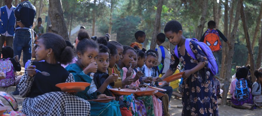 Children Enjoy Communal Meals Through Feeding Program